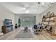 Inviting living room with a large window, backyard views, and contemporary furniture at 4921 Barnstead Dr, Riverview, FL 33578