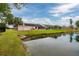 View of the pond and backyard highlighting the peaceful setting at 502 36Th W St, Palmetto, FL 34221