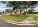 Well-maintained single-Gathering house featuring a lush green lawn with mature trees at 502 36Th W St, Palmetto, FL 34221