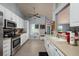 Bright and spacious kitchen with stainless steel appliances and views to the living area at 502 36Th W St, Palmetto, FL 34221