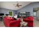 Bright living room featuring modern decor, comfortable seating, and a media center at 502 36Th W St, Palmetto, FL 34221