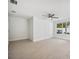 Bright, airy bedroom with a ceiling fan, neutral color palette, and tile floors, providing a calm living space at 504 69Th St, Holmes Beach, FL 34217