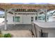 Gazebo in backyard with hot tub, and brick flooring, perfect for outdoor relaxation at 504 69Th St, Holmes Beach, FL 34217