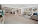 Spacious open-concept living area with tile floors and a view to the kitchen at 504 69Th St, Holmes Beach, FL 34217