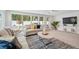 Comfortable living area with lots of natural light, tile floors and TV at 504 69Th St, Holmes Beach, FL 34217