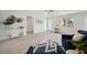 Bright and airy living room with tile flooring, decor, and a stylish accent rug at 504 69Th St, Holmes Beach, FL 34217