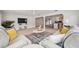Large living room with tile floors, cozy seating, and open floor plan at 504 69Th St, Holmes Beach, FL 34217