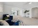 Open-concept living room with elegant arches, modern decor, and inviting atmosphere at 504 69Th St, Holmes Beach, FL 34217