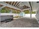 Enjoy a relaxing backyard with an outdoor covered patio, hot tub and a convenient shed at 504 69Th St, Holmes Beach, FL 34217