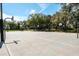 A large basketball court with multiple hoops offers a fun and active recreational space for residents and guests at 5269 Karlsburg Pl, Palm Harbor, FL 34685