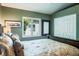Comfortable bedroom featuring plantation shutters, closet and ensuite bathroom access at 5269 Karlsburg Pl, Palm Harbor, FL 34685