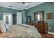 Spacious main bedroom with beautiful trim, vanity, and an ensuite bathroom at 5269 Karlsburg Pl, Palm Harbor, FL 34685