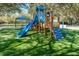 A colorful and safe playground provides a fun and engaging space for children to play and explore at 5269 Karlsburg Pl, Palm Harbor, FL 34685