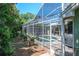 A beautiful screened-in pool provides the perfect outdoor leisure at 5269 Karlsburg Pl, Palm Harbor, FL 34685