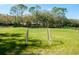 Soccer goal sitting on a sprawling grassy field provides a great opportunity for outdoor sports and recreation at 5269 Karlsburg Pl, Palm Harbor, FL 34685