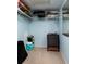 View of an organized closet with metal shelving and storage space at 5575 Gulf Blvd # 421, St Pete Beach, FL 33706