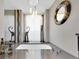 Stylish bathtub area with elegant fixtures, modern decor, and plenty of natural light at 5807 Thoreau Pl, Lithia, FL 33547