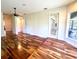 Spacious bonus room with natural light and hardwood floors at 5807 Thoreau Pl, Lithia, FL 33547