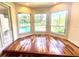 Sunlit bonus room with large windows overlooking the pool at 5807 Thoreau Pl, Lithia, FL 33547