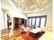 Bright living room with modern furnishings and large doors leading to the lanai at 5807 Thoreau Pl, Lithia, FL 33547
