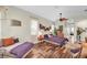 Cozy main bedroom with a ceiling fan, wood floors, and ample space at 5807 Thoreau Pl, Lithia, FL 33547