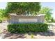 Stone sign at community entrance for The Reserve surrounded by well-maintained landscaping at 5807 Thoreau Pl, Lithia, FL 33547