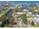 Stunning aerial view of waterfront homes and canals, showcasing a serene coastal community with boat docks at 6732 Udell Ln, Hudson, FL 34667