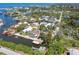 Beautiful birds eye view of waterfront neighborhood with access to gulf and a home with private pool and dock at 6732 Udell Ln, Hudson, FL 34667