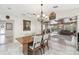 Dining room view with open access to the living room and pool area at 6732 Udell Ln, Hudson, FL 34667