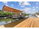 Private boat lift, ideal for easy access to waterway activities at 6732 Udell Ln, Hudson, FL 34667