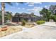 Rear exterior view of the home with a screened in pool and boat dock at 6732 Udell Ln, Hudson, FL 34667