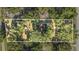 Sprawling property with lush greenery and mature trees, a peaceful oasis at 7157 Quail Hollow Blvd, Wesley Chapel, FL 33544