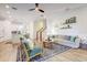 Open-concept living room and kitchen area, perfect for entertaining at 7501 S Morton St, Tampa, FL 33616