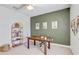 Bright office featuring neutral walls, stylish decor, desk, and complementary earth-tone decor at 7501 S Morton St, Tampa, FL 33616