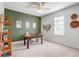 Bright office features neutral walls, stylish decor, and natural light from the window at 7501 S Morton St, Tampa, FL 33616