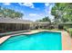 Beautiful in-ground pool, patio area, and a charming gazebo in the meticulously maintained backyard at 7703 W Hiawatha St, Tampa, FL 33615