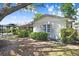 A charming single-story home featuring well-maintained landscaping at 7703 W Hiawatha St, Tampa, FL 33615