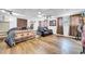 Spacious bedroom offers ample room for a bed, sofa and showcases wood-look floors at 8115 N Ola Ave, Tampa, FL 33604