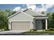 Charming single-story home featuring an attached two-car garage, neutral stucco, and a well-maintained lawn at 821 Steel Dr, Apollo Beach, FL 33572