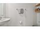 Clean powder room featuring a classic pedestal sink and stylish towel rack at 8953 Gallantree Pl, Land O Lakes, FL 34637