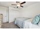 Bedroom with light blue bedding and closet at 8953 Gallantree Pl, Land O Lakes, FL 34637
