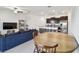 Bright living area with open concept layout into kitchen and dining area at 8953 Gallantree Pl, Land O Lakes, FL 34637