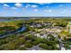 Desirable community surrounded by canals and mature trees at 101 Dogwood Cir, Seminole, FL 33777