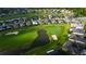 Aerial view of the community showcasing the golf course, ponds, and well-spaced homes at 10103 Old Tampa Bay Dr, San Antonio, FL 33576