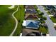 This aerial view showcases the property's proximity to a golf course and its well-maintained neighborhood at 10103 Old Tampa Bay Dr, San Antonio, FL 33576