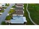Aerial view of the property showcasing its well-manicured lawn, and proximity to the golf course at 10103 Old Tampa Bay Dr, San Antonio, FL 33576