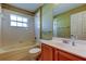 Cozy bathroom featuring a shower-tub combination and a single sink vanity at 10103 Old Tampa Bay Dr, San Antonio, FL 33576
