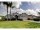 Charming single-story home with a two-car garage and a well-manicured front lawn at 10103 Old Tampa Bay Dr, San Antonio, FL 33576