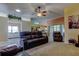 Comfortable living room with plush carpeting, and abundant natural light at 10103 Old Tampa Bay Dr, San Antonio, FL 33576