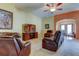 Open concept living area with comfortable seating and entertainment setup at 10103 Old Tampa Bay Dr, San Antonio, FL 33576